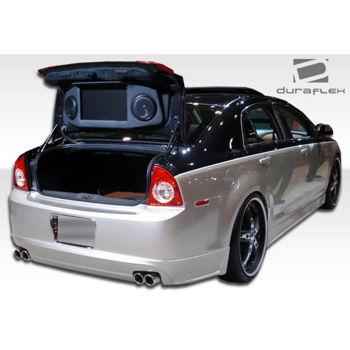 Modify your Chevrolet Malibu 2008 with our Exterior/Side Skirts - Rear angle view of the vehicle with trunk open