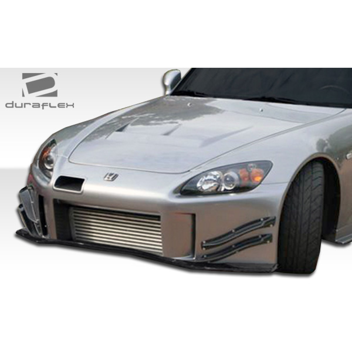 Modify your Honda S2000 2000 with our Exterior/Complete Body Kits - Front view of vehicle part at a low angle