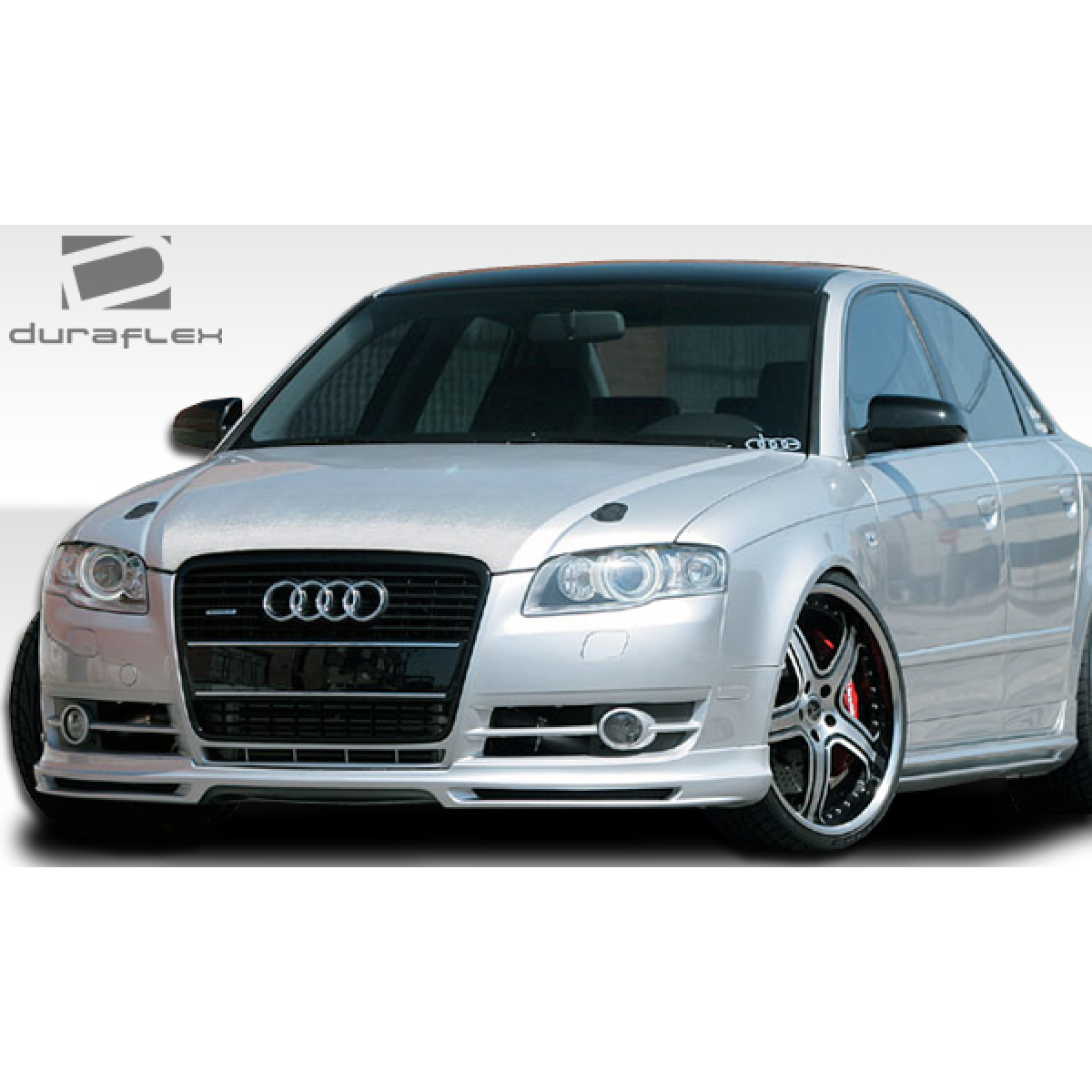 Modify your Audi A4 2002 with our Exterior/Side Skirts - Front angle view of an Audi A4 with body kit