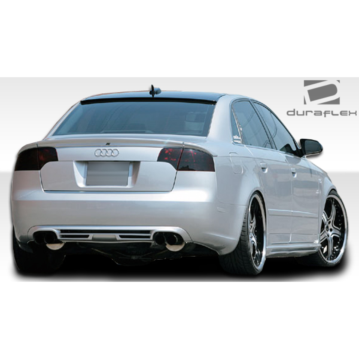 Modify your Audi A4 2002 with our Exterior/Side Skirts - Rear view of vehicle at a slight angle