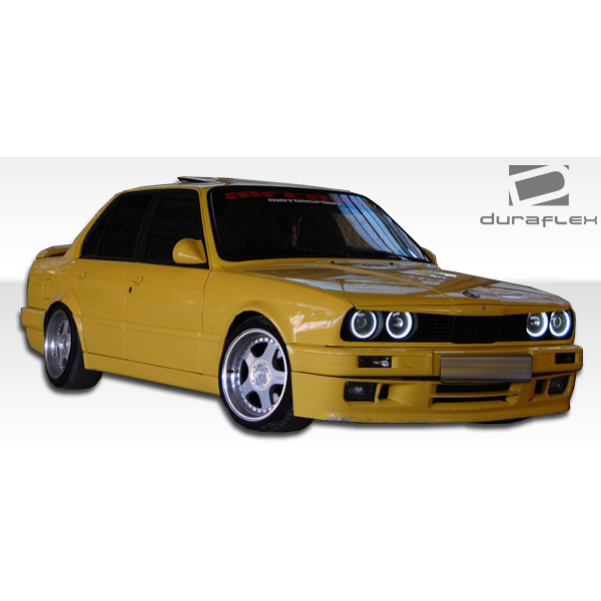 Modify your BMW 3-Series 1988 with our Exterior/Complete Body Kits - Front angle view of a modified yellow BMW