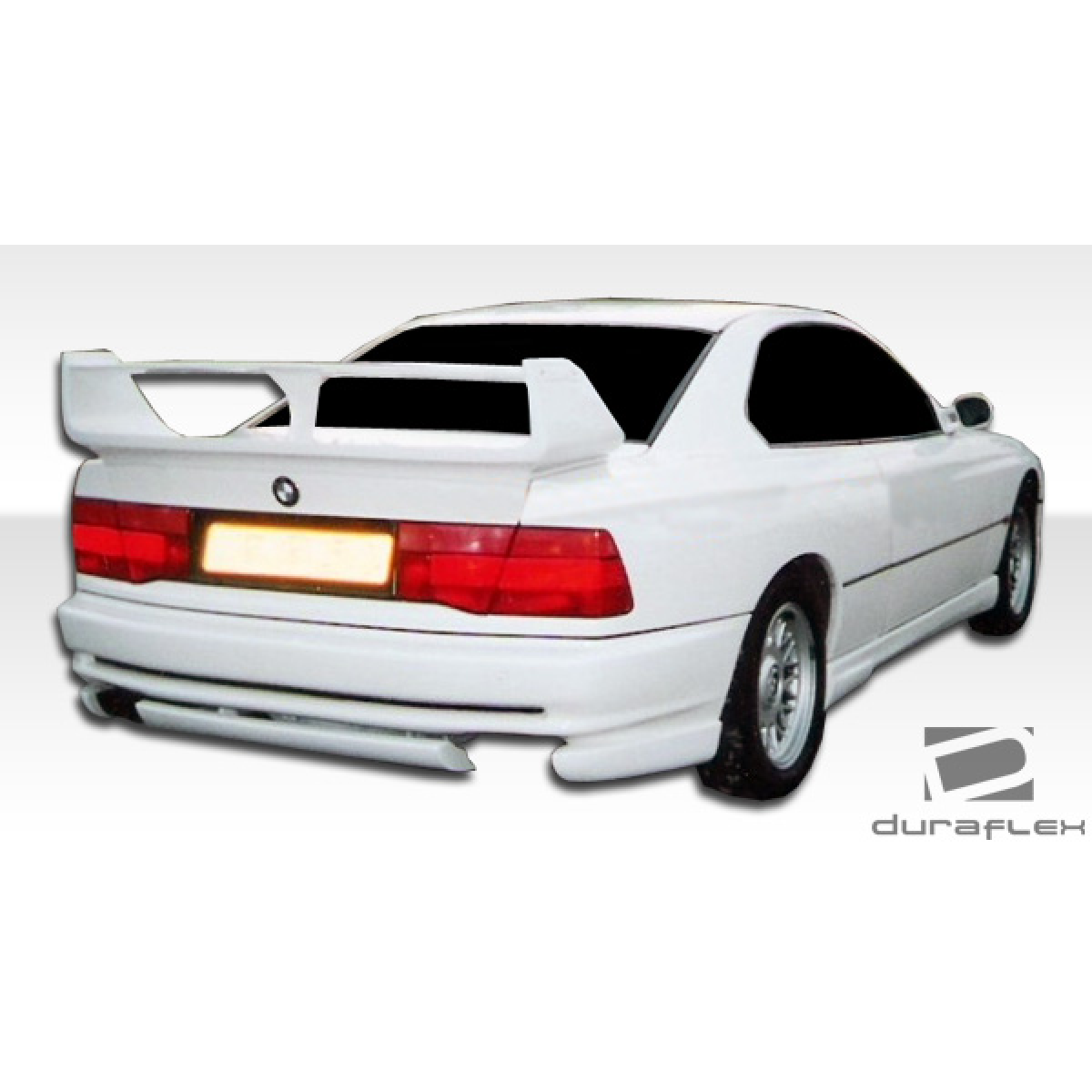 Modify your BMW 8-Series 1991 with our Exterior/Side Skirts - Rear angle view of the BMW 8 Series car