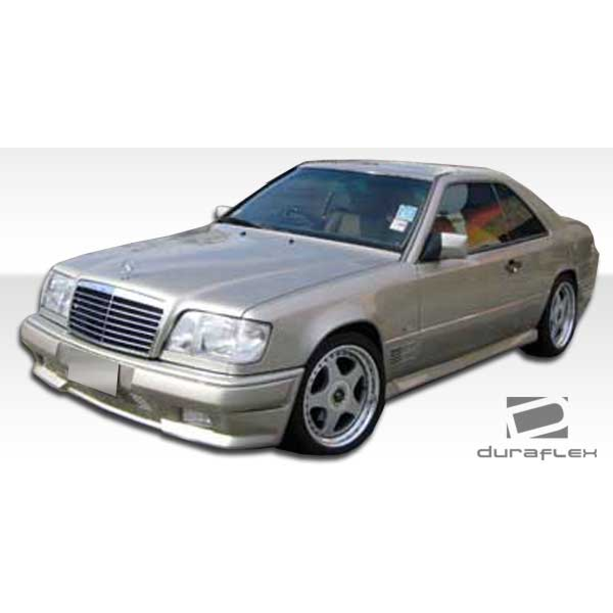 Modify your Mercedes-Benz E-Class 1986 with our Exterior/Complete Body Kits - Front view of the vehicle at a slight angle