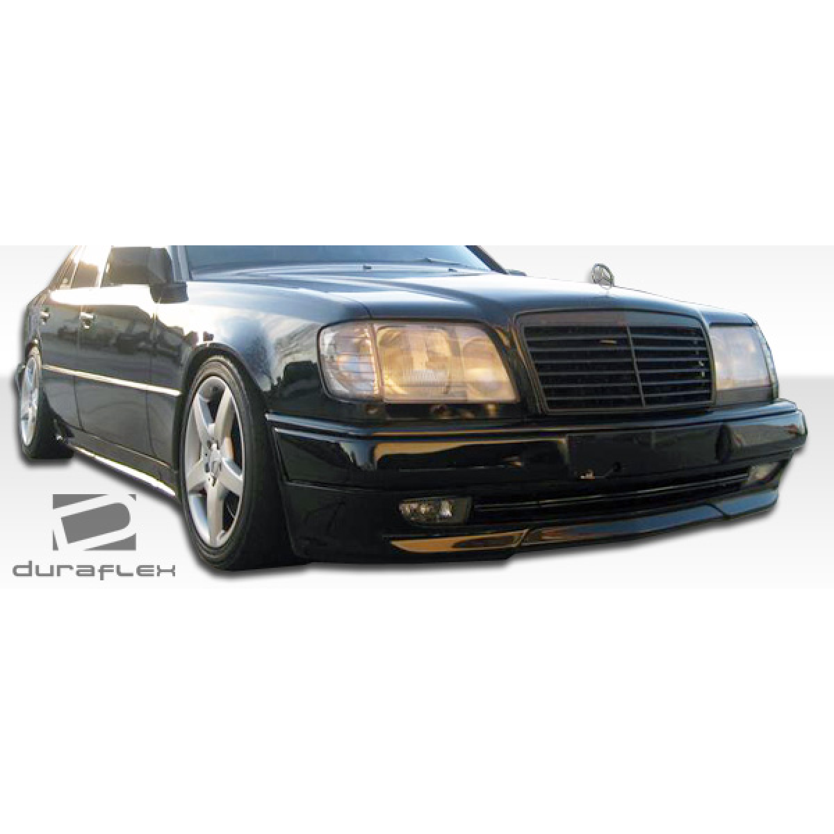 Modify your Mercedes-Benz E-Class 1986 with our Exterior/Side Skirts - Front three quarter angle of the vehicle