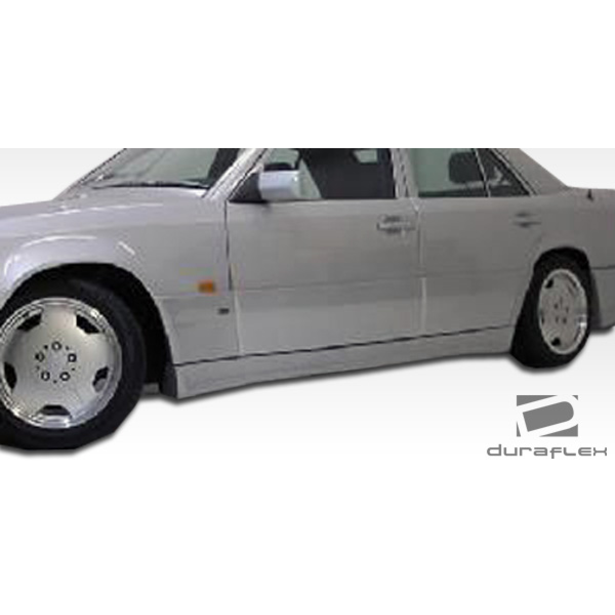 Modify your Mercedes-Benz E-Class 1986 with our Exterior/Side Skirts - Side view of the vehicle at a slight angle