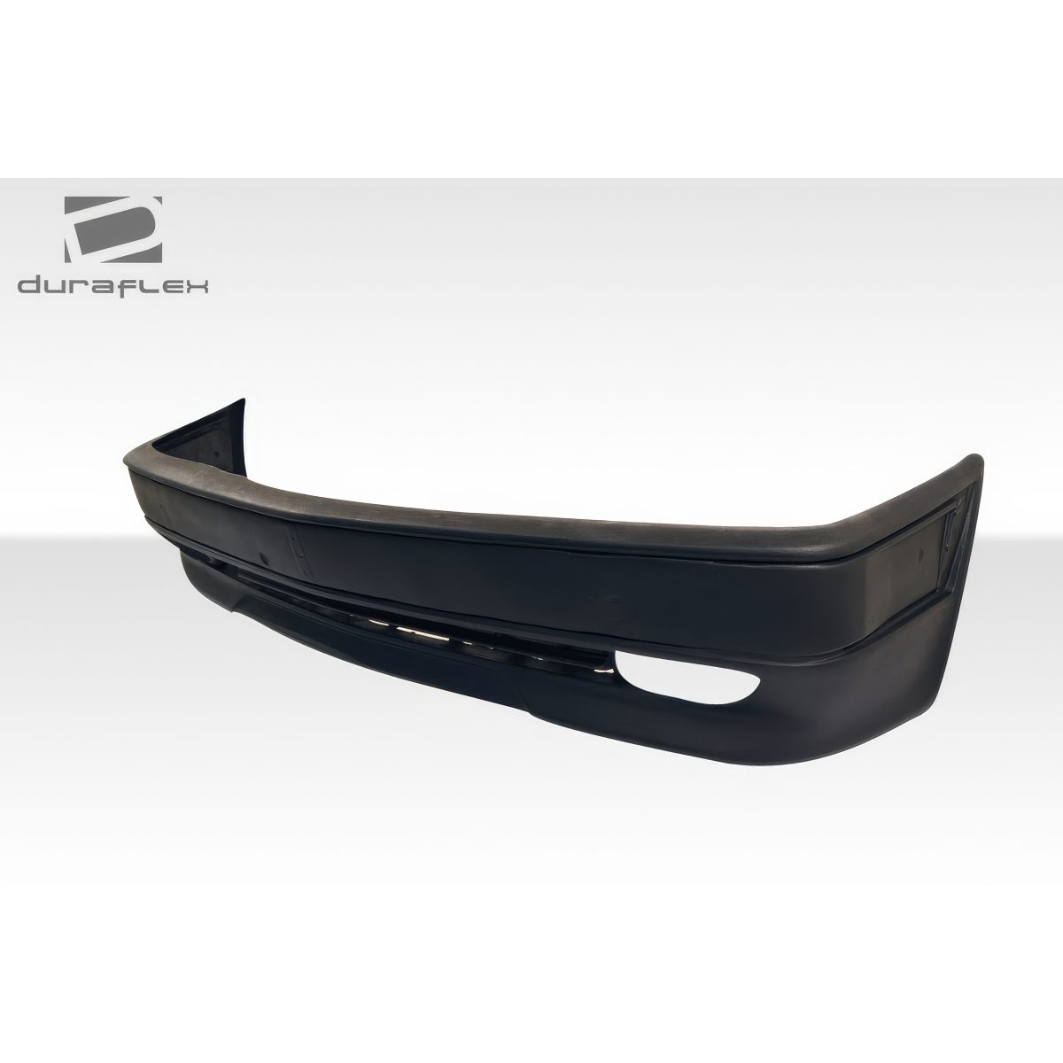 Modify your Mercedes-Benz C-Class 1986 with our Exterior/Front Bumpers or Lips - Front view of the bumper part at slight angle