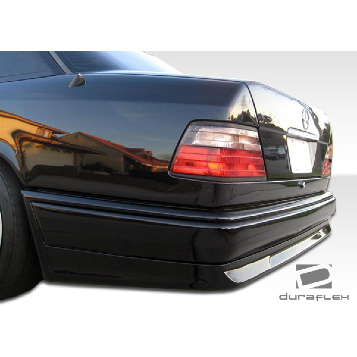 Modify your Mercedes-Benz C-Class 1986 with our Exterior/Rear Bumpers or Lips - Rear angle view of the bumper on a Mercedes-Benz