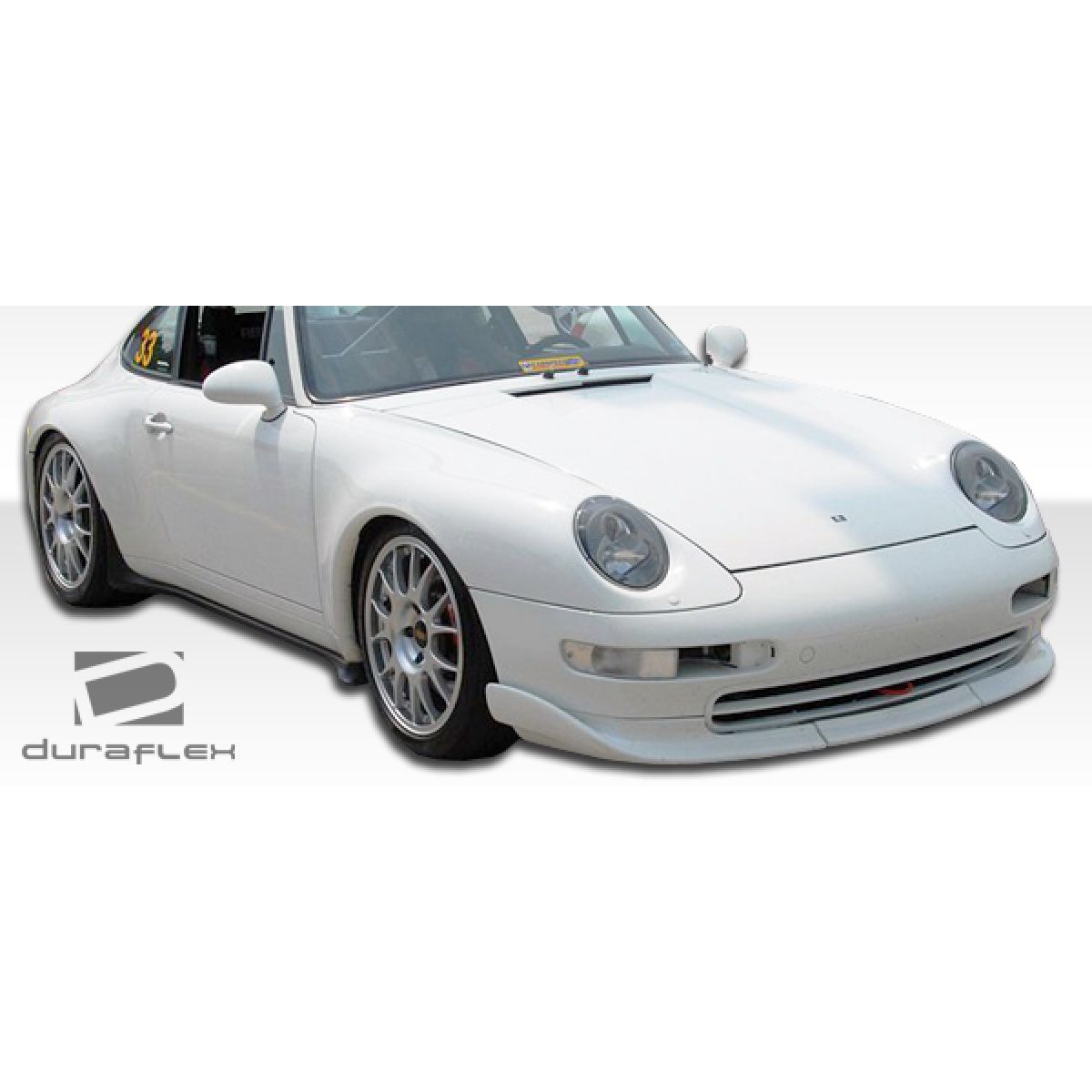 Modify your Porsche 911 1995 with our Exterior/Front Bumpers or Lips - Front angle view of a white Porsche 911 car