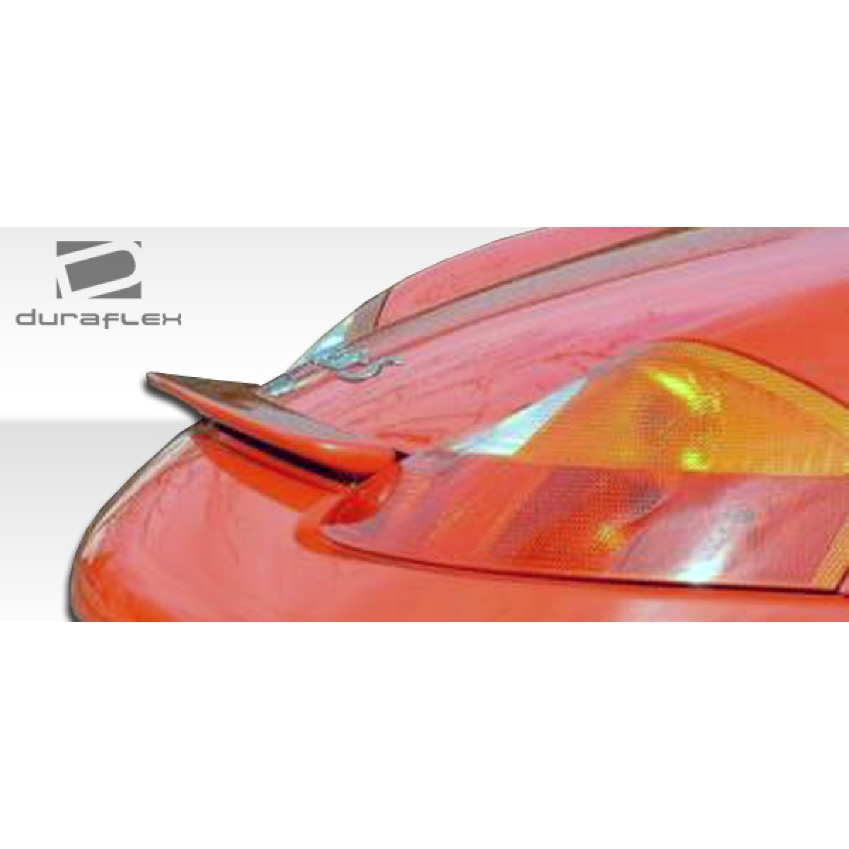 Modify your Porsche Boxster 1997 with our Exterior/Wings - Rear angle view of a car trunk lid spoiler