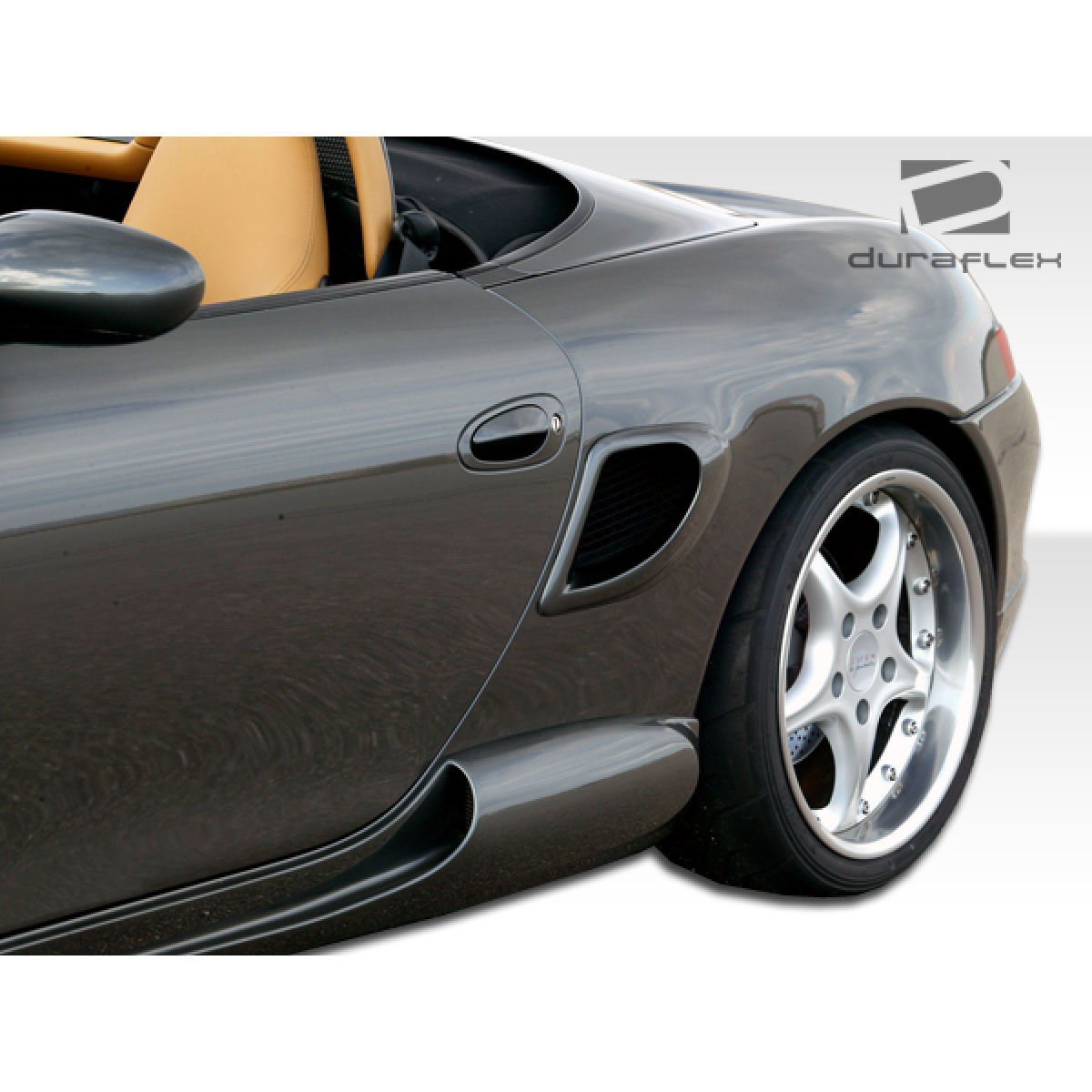 Modify your Porsche Boxster 1997 with our Exterior/Complete Body Kits - Image shows a close side angle of vehicle part