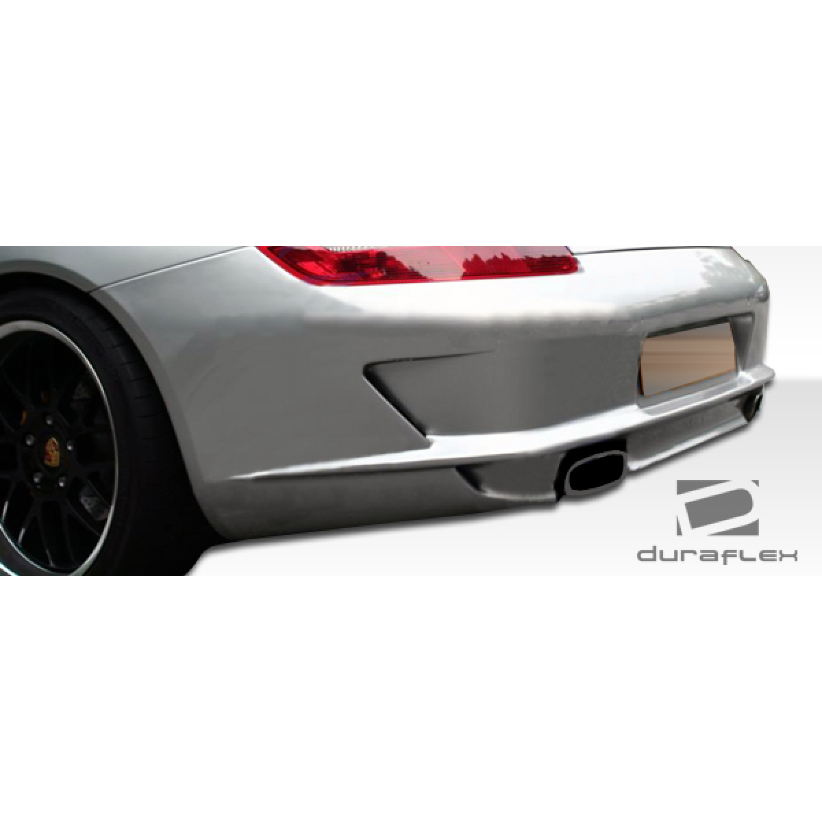 Modify your Porsche 911 2005 with our Exterior/Rear Bumpers - Rear angle view showcasing the bumper design