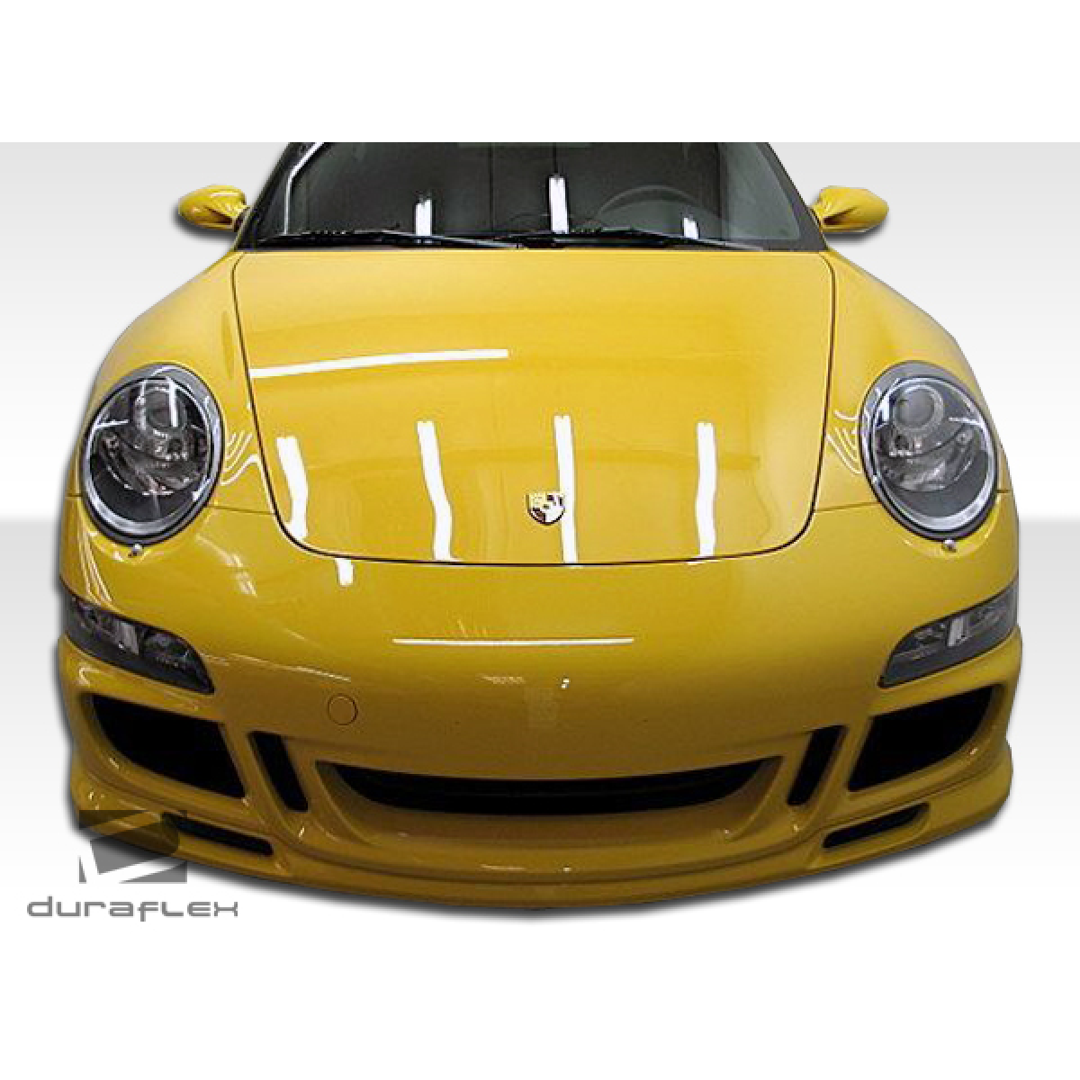 Modify your Porsche 911 2005 with our Exterior/Complete Body Kits - Front view of a yellow Porsche at eye level