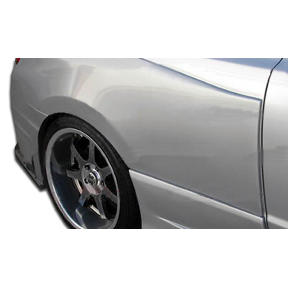 Modify your Honda Civic 2006 with our Exterior/Complete Body Kits - Angled view of rear fender with wheel partially visible