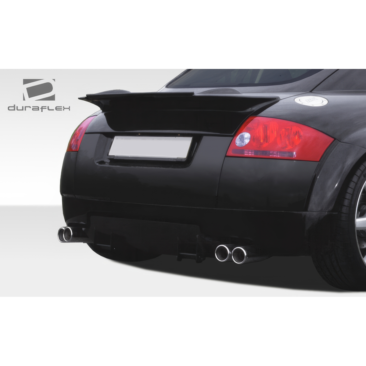 Modify your Audi TT 2000 with our Exterior/Wings - Rear angle view of black Audi TT with spoiler