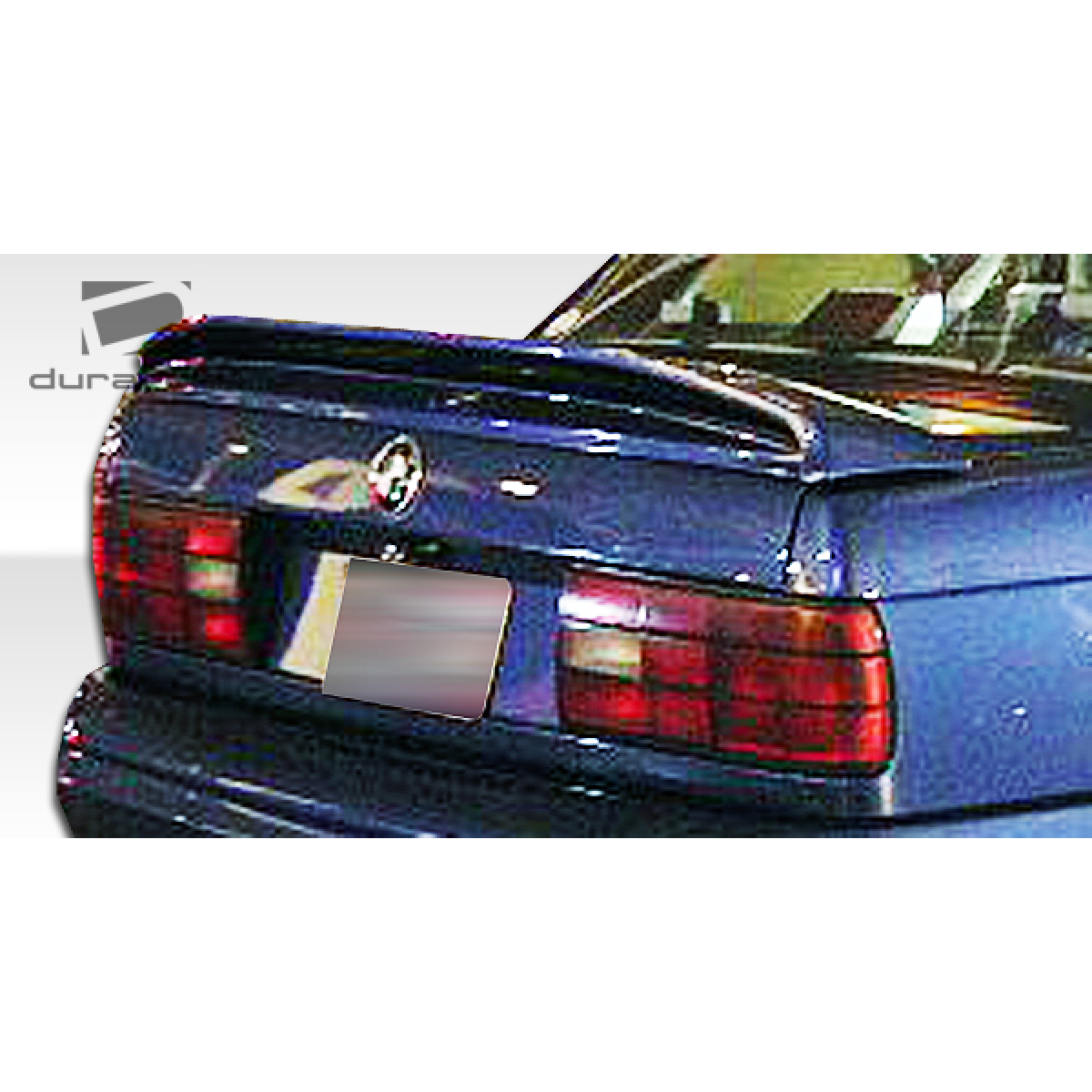 Modify your BMW 3-Series 1984 with our Exterior/Wings - Rear view angle of the BMW 3 Series E30 part