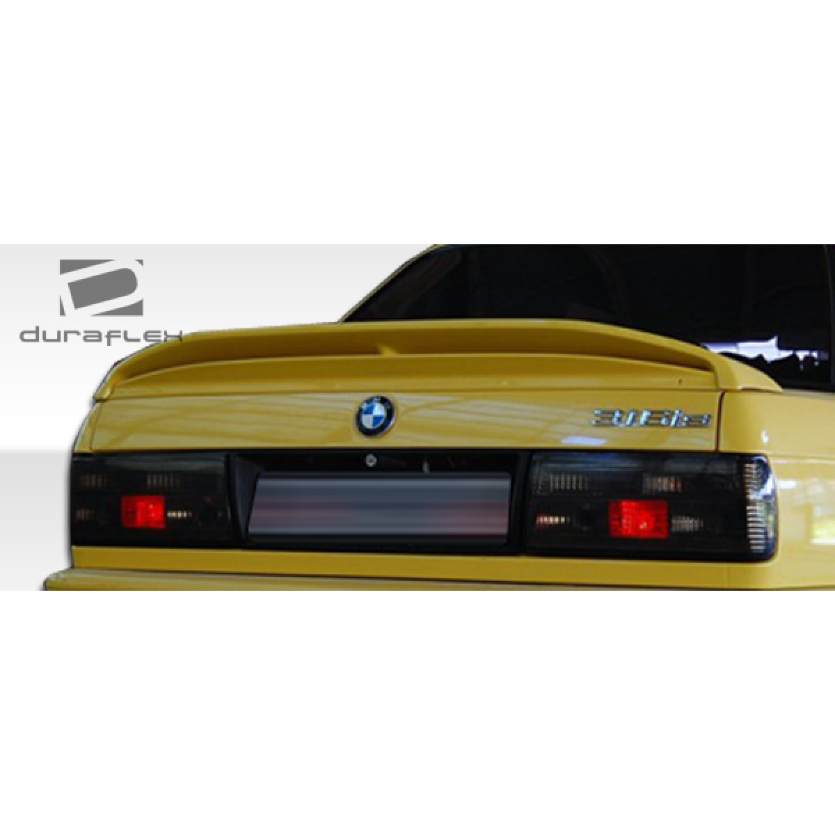 Modify your BMW 3-Series 1984 with our Exterior/Wings - View of rear angle of car trunk spoiler