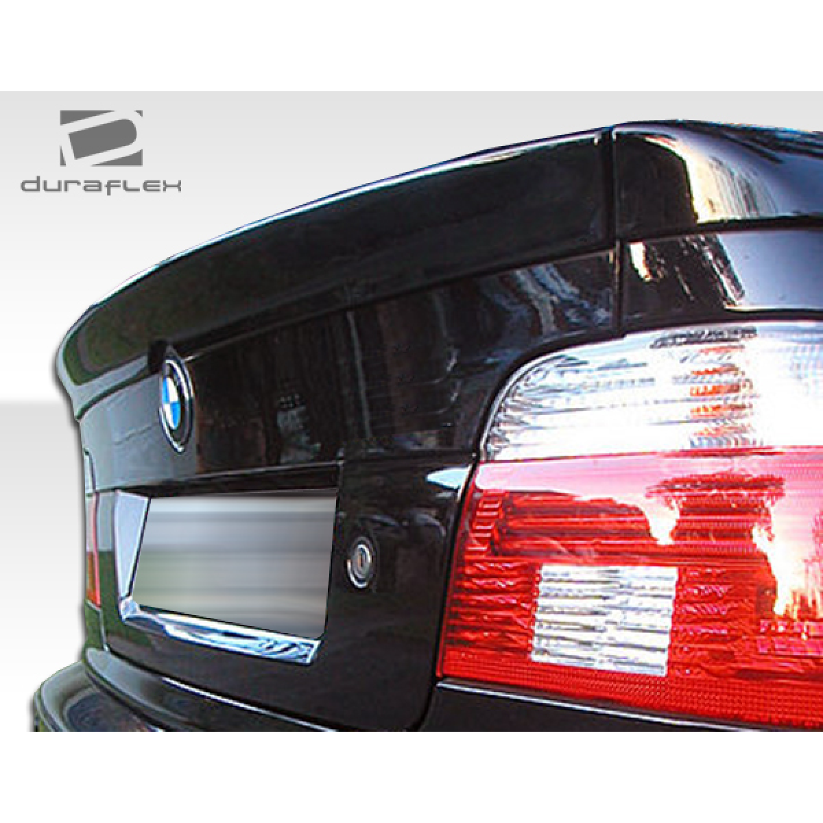 Modify your BMW 3-Series 1997 with our Exterior/Wings - Rear view angled from above showing trunk lid spoiler