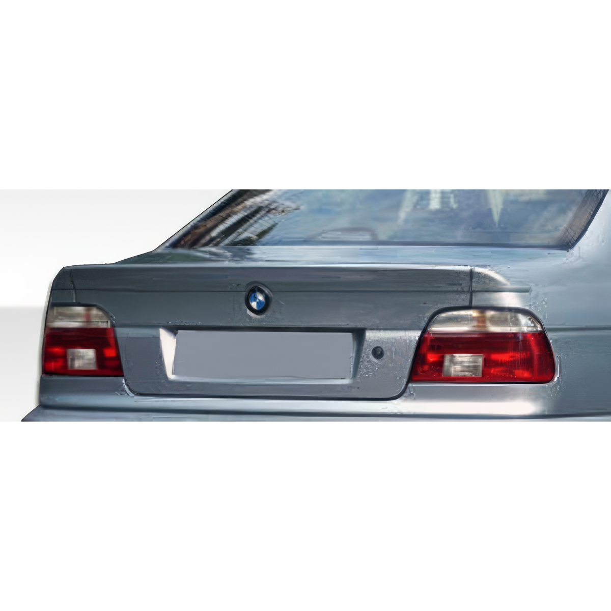 Modify your BMW 3-Series 1997 with our Exterior/Wings - Rear view of vehicle at a slight angle