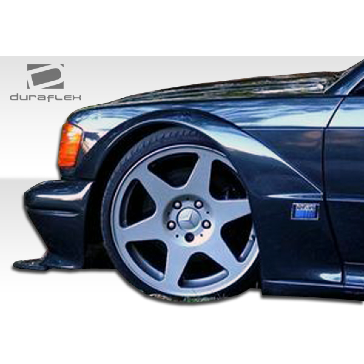 Modify your Mercedes-Benz 190 1984 with our Exterior/Complete Body Kits - Image shows wide body fender flares at side angle