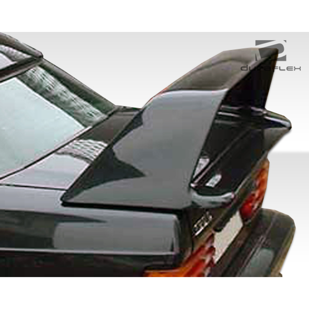 Modify your Mercedes-Benz 190 1984 with our Exterior/Wings - Rear angle view of spoiler on vehicle