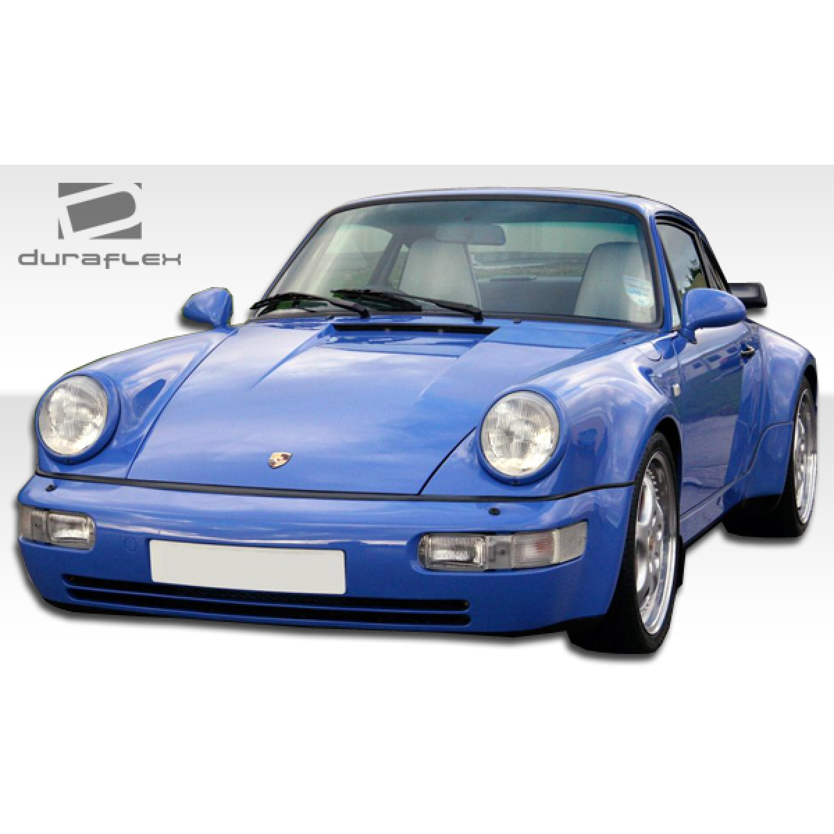 Modify your Porsche 911 1989 with our Exterior/Front Bumpers - Front angle view of a blue Porsche 911