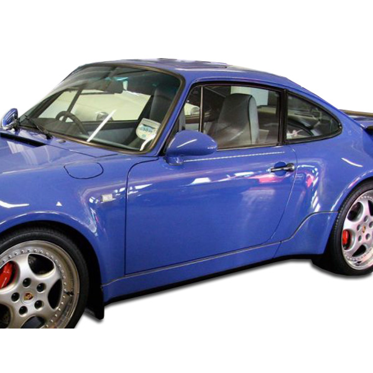 Modify your Porsche 911 1989 with our Exterior/Side Skirts - Side view angle showcasing the side skirts