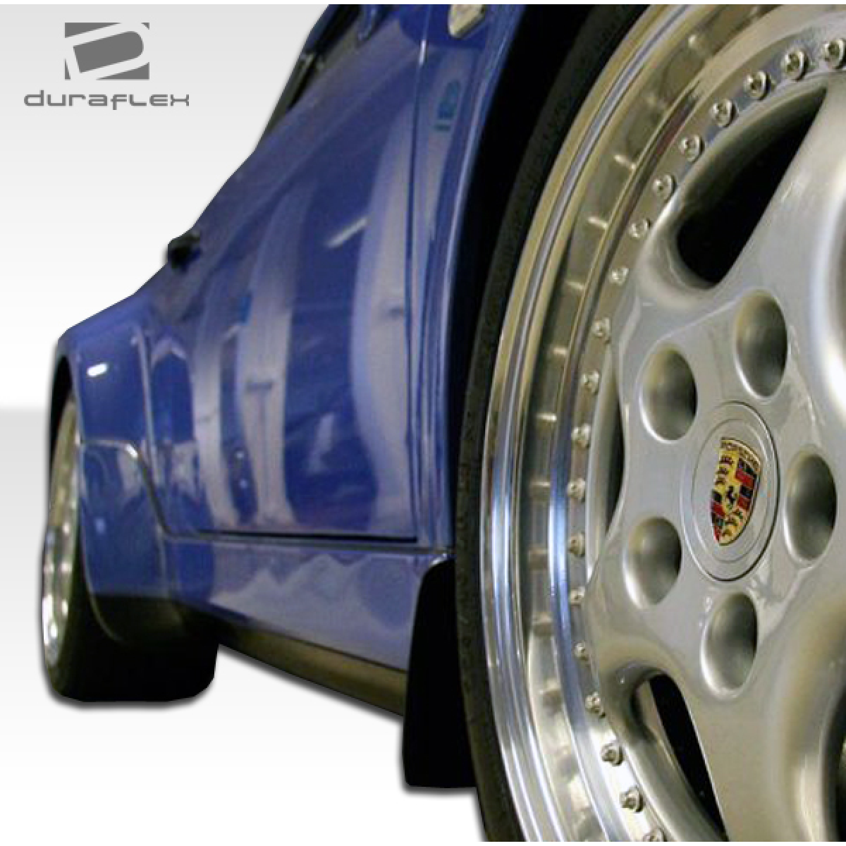 Modify your Porsche 911 1989 with our Exterior/Side Skirts - Viewing from a low angle focusing on wheels