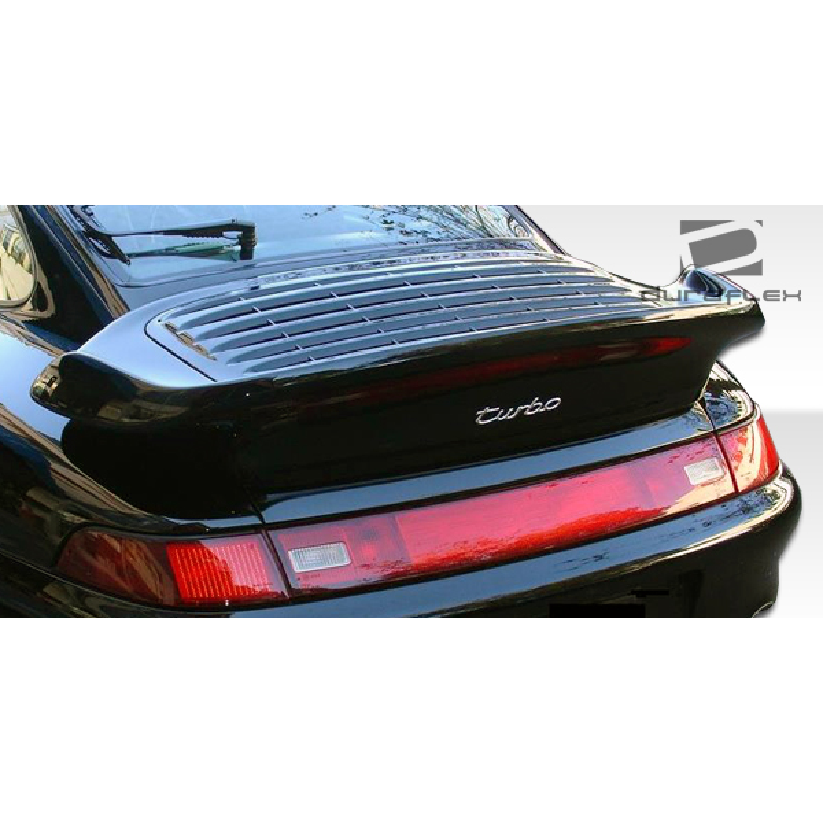 Modify your Porsche 911 1995 with our Exterior/Wings - Rear view angle showing trunk lid spoiler