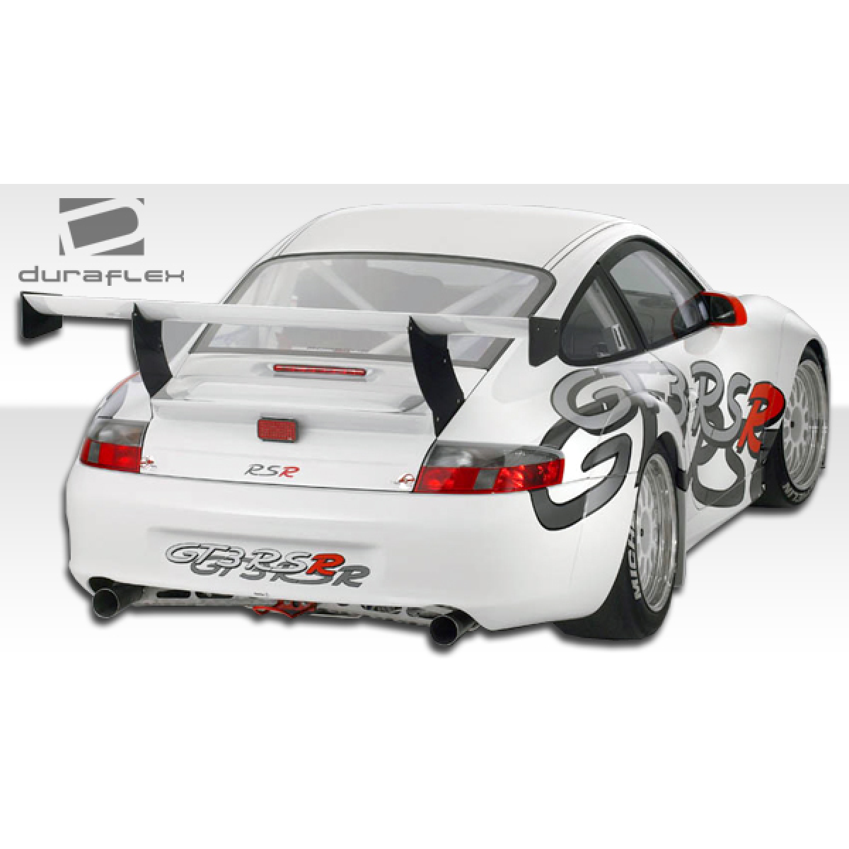 Modify your Porsche 911 2002 with our Exterior/Side Skirts - Rear view angle showing modifications on vehicle