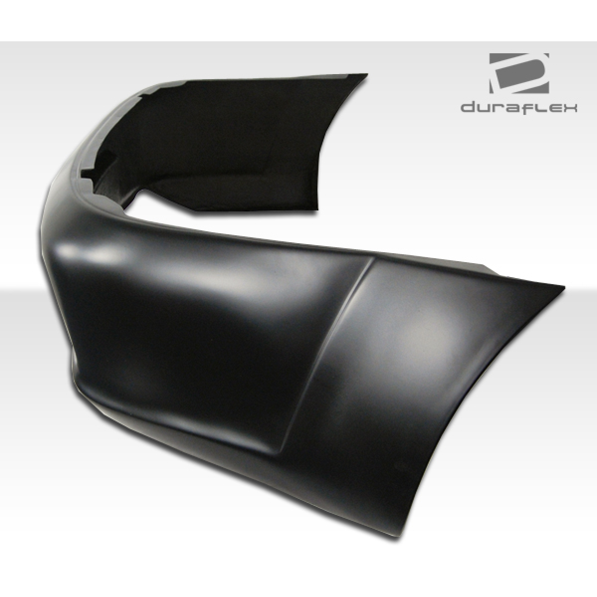 Modify your Porsche 911 2002 with our Exterior/Rear Bumpers - Showing the rear bumper at a side angle