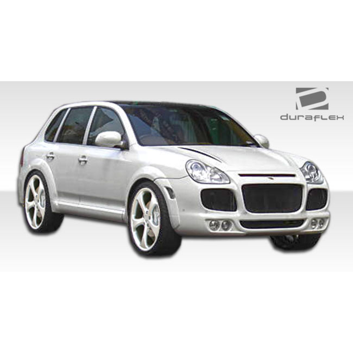 Modify your Porsche Cayenne 2003 with our Exterior/Front Bumpers or Lips - Front view of the SUV emphasizing the bumper design