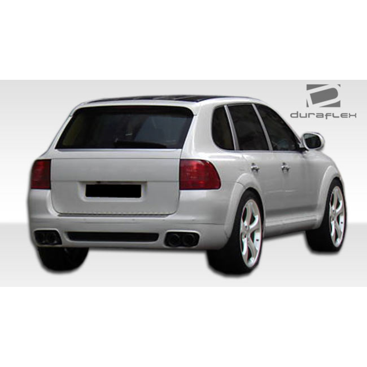 Modify your Porsche Cayenne 2003 with our Exterior/Fenders - Rear angle showing vehicle body and exhaust