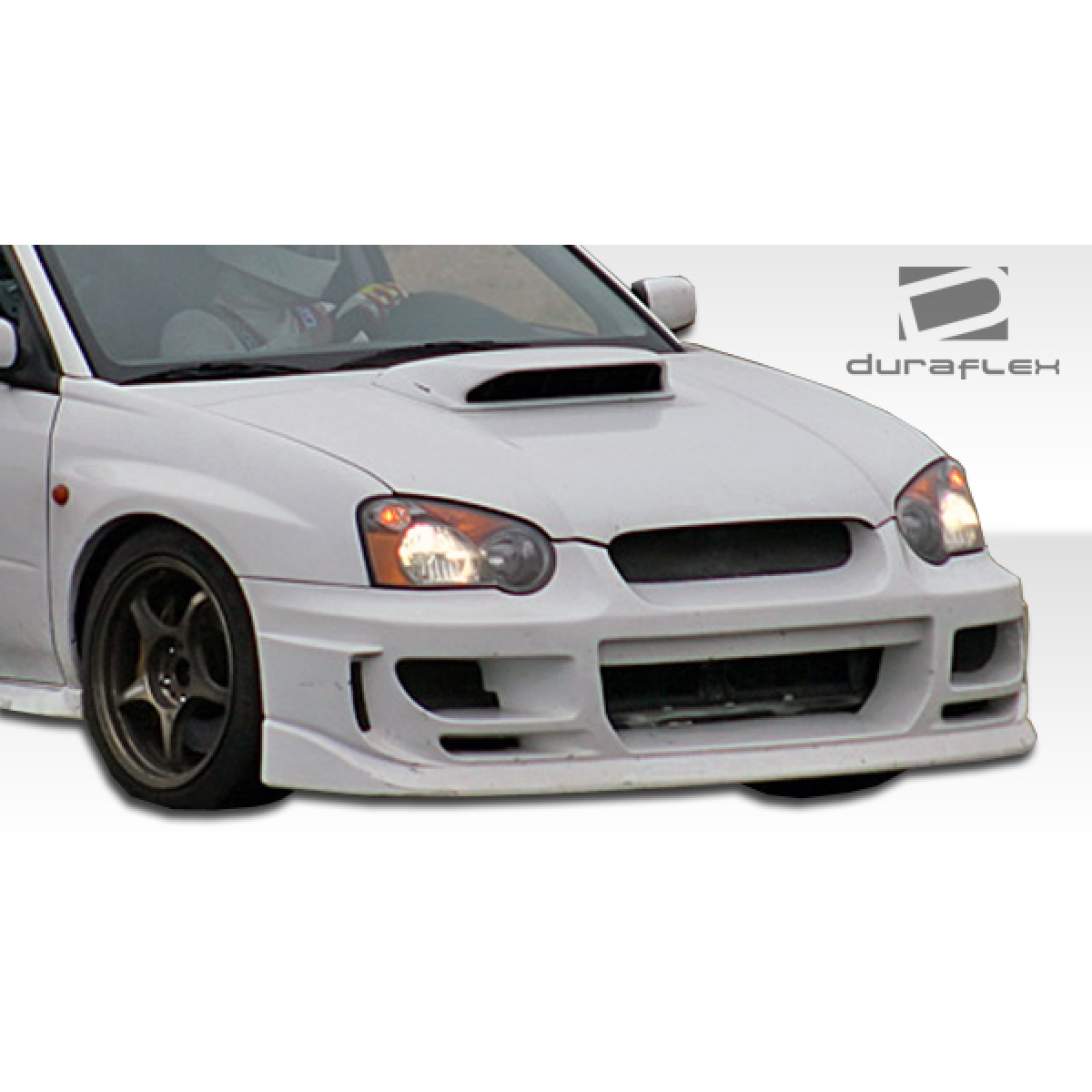 Modify your Subaru Impreza 2004 with our Exterior/Front Bumpers or Lips - Front view of the vehicle at a slight angle