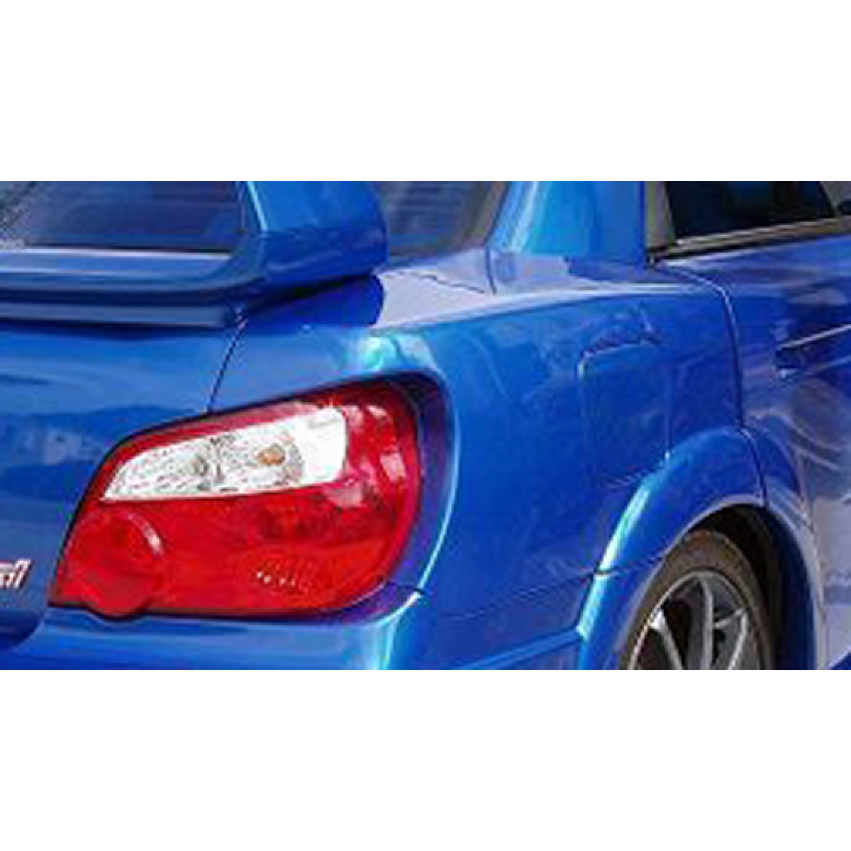 Modify your Subaru Impreza 2004 with our Exterior/Complete Body Kits - Rear quarter view showing fuel cap area