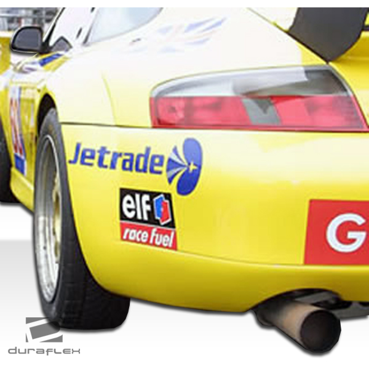 Modify your Porsche 911 1999 with our Exterior/Complete Body Kits - Rear view angle of the yellow Porsche 911