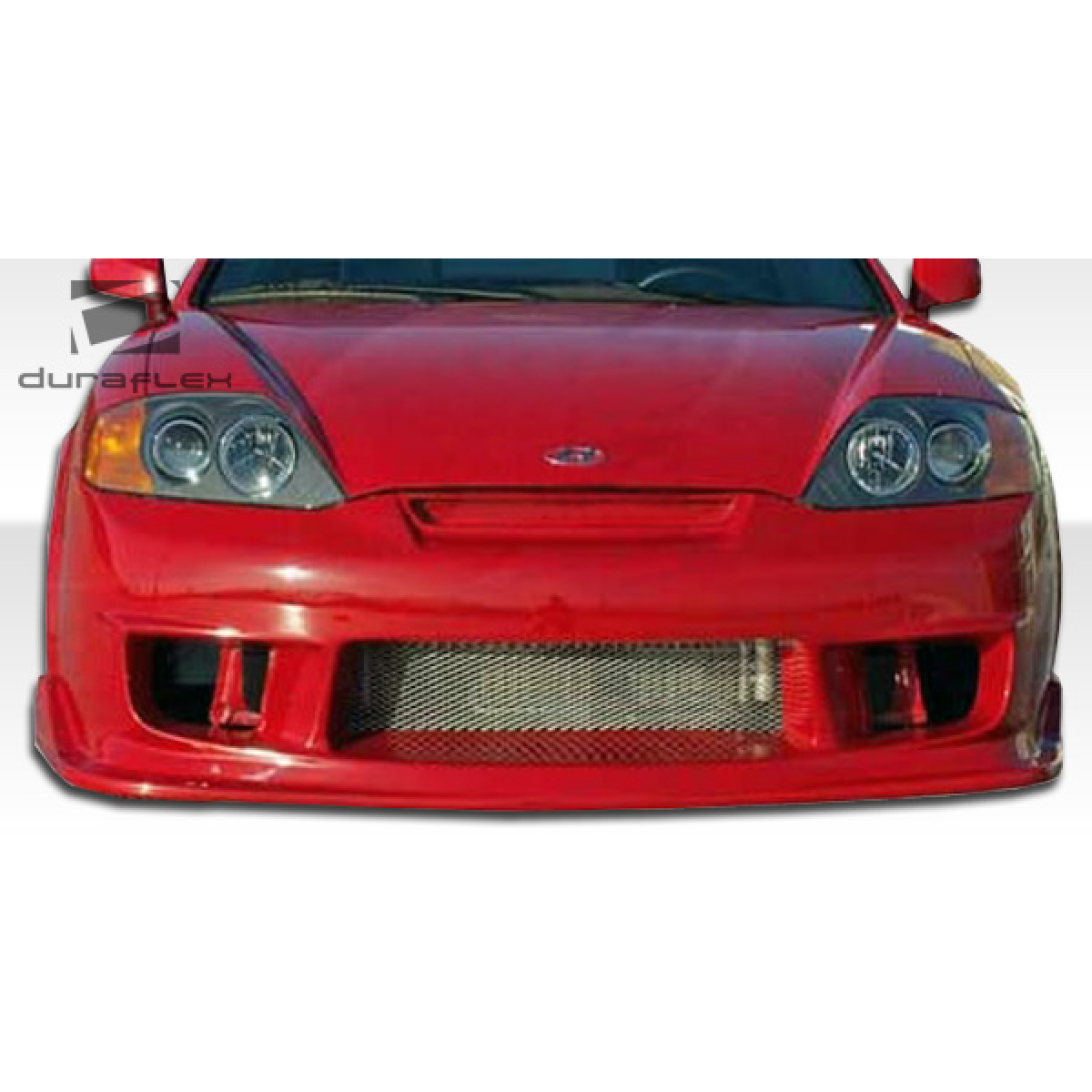 Modify your Hyundai Tiburon 2003 with our Exterior/Front Bumpers or Lips - Front view of car part at slight angle