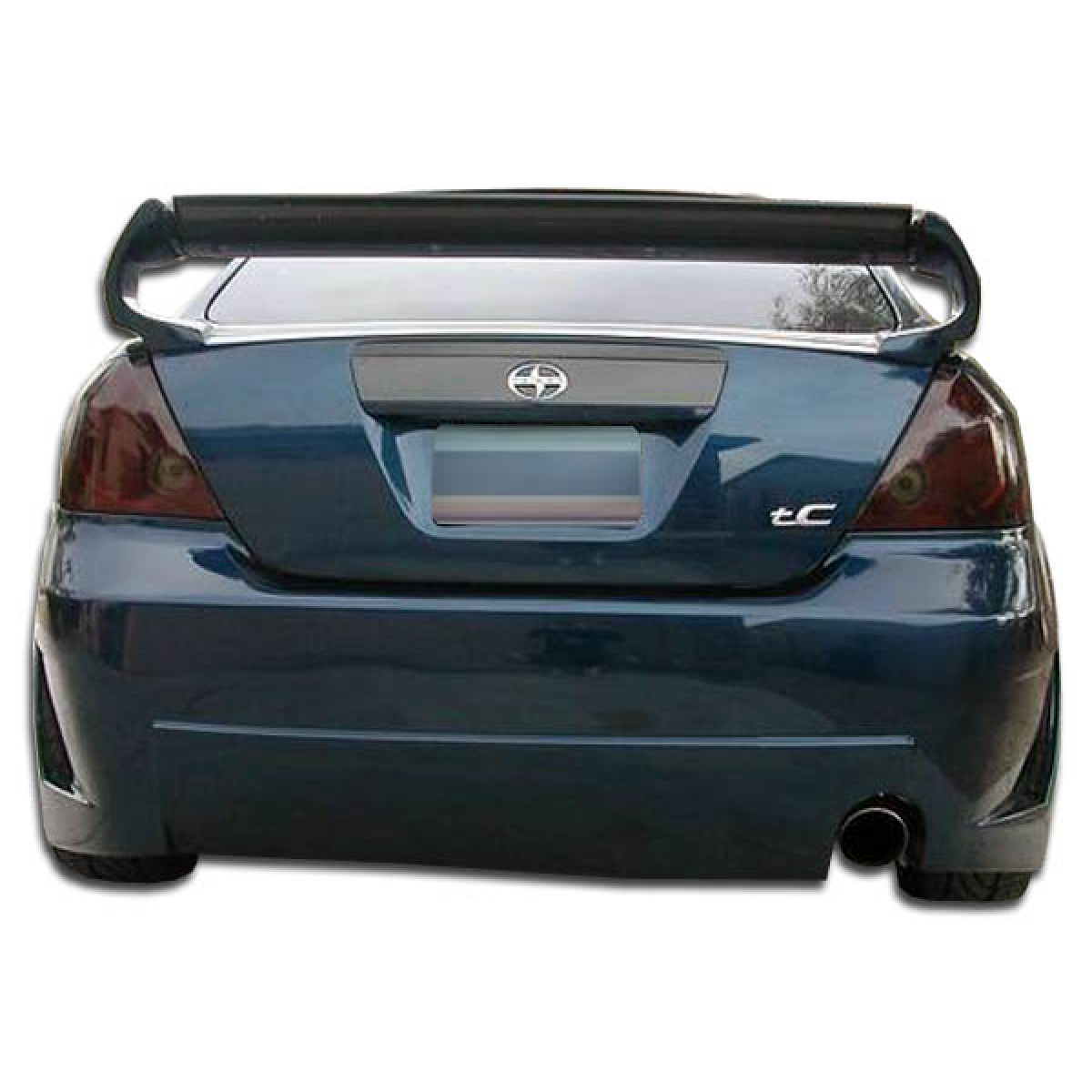 Modify your Scion tC 2005 with our Exterior/Rear Bumpers or Lips - Rear view of the car from a slightly elevated angle