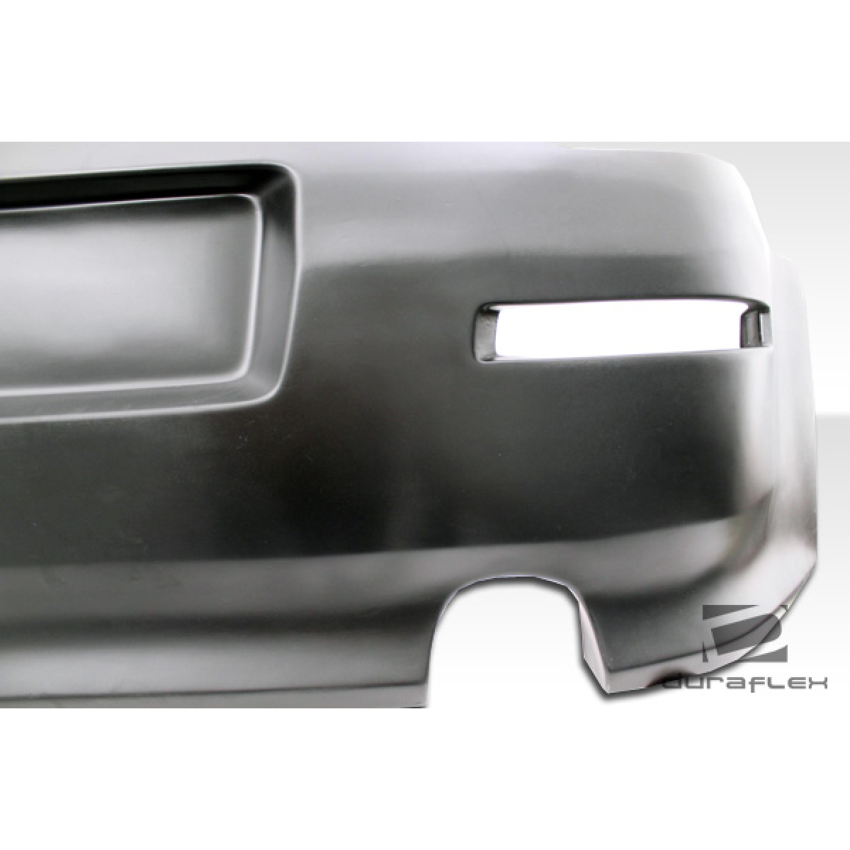 Modify your Nissan 350Z 2003 with our Exterior/Rear Bumpers or Lips - Part shown at a slight angle from the side