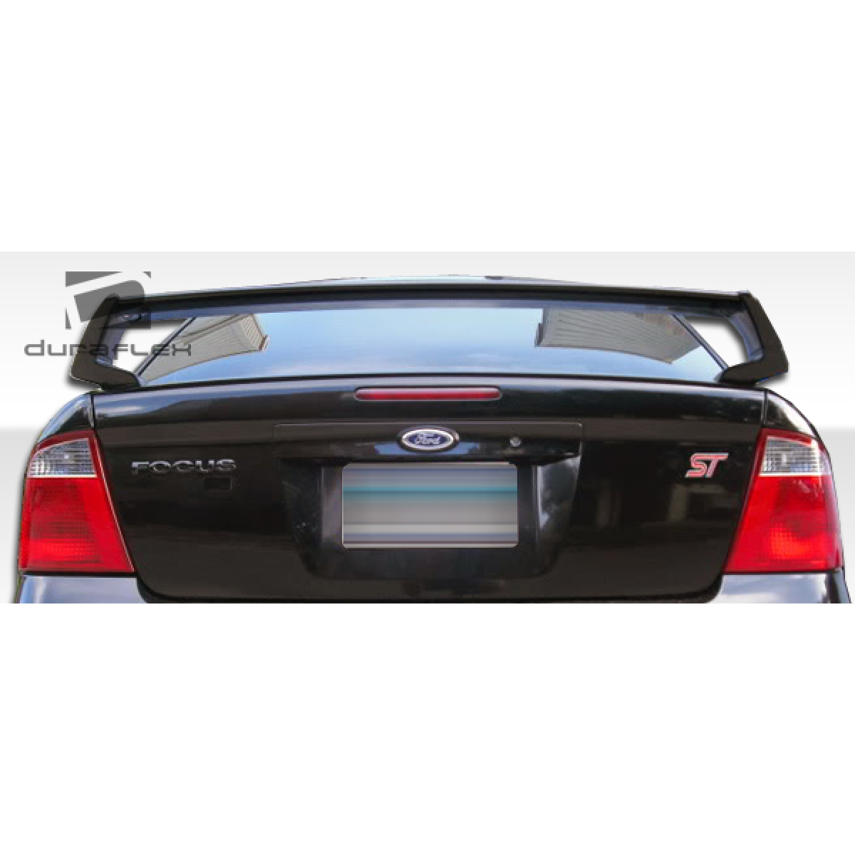 Modify your Ford Focus 2000 with our Exterior/Wings - Rear view angle showing trunk lid spoiler