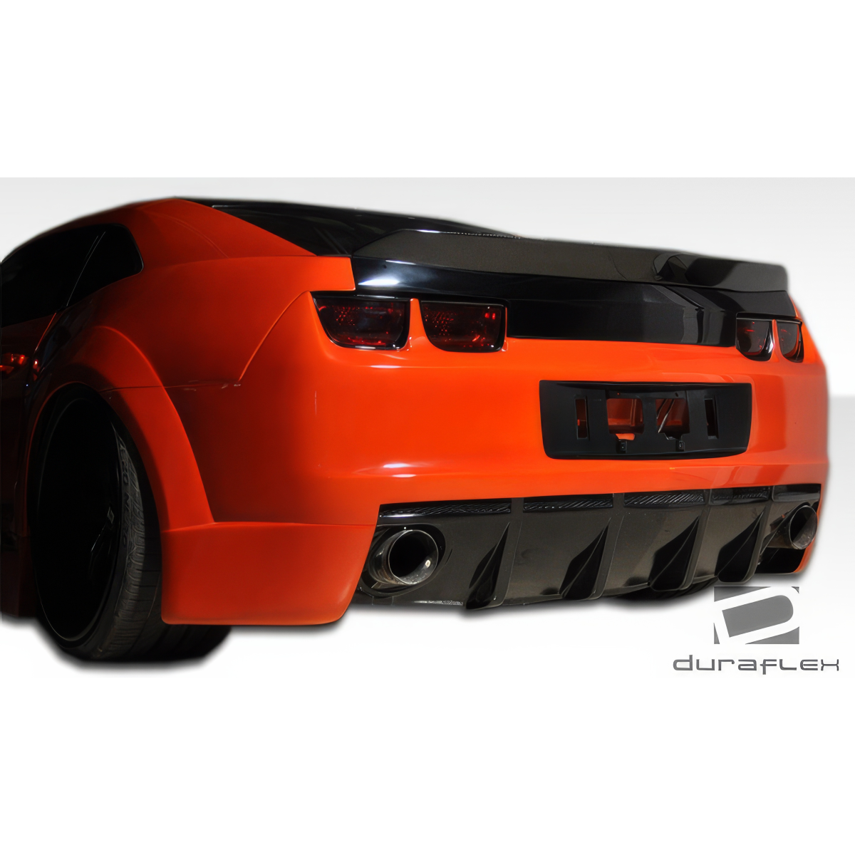 Modify your Chevrolet Camaro 2010 with our Exterior/Rear Bumpers or Lips - View is from a low angle showing rear perspective