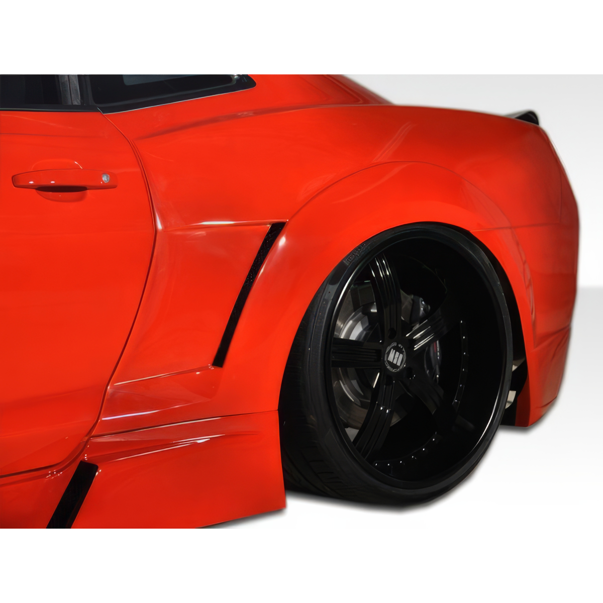 Modify your Chevrolet Camaro 2010 with our Exterior/Fenders - Rear angle showcasing wide body fender flares