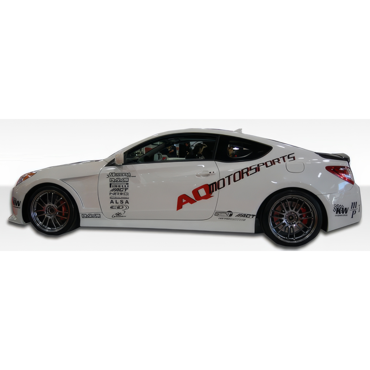 Modify your Genesis G70 2010 with our Exterior/Side Skirts - Side view of a car at a slight angle