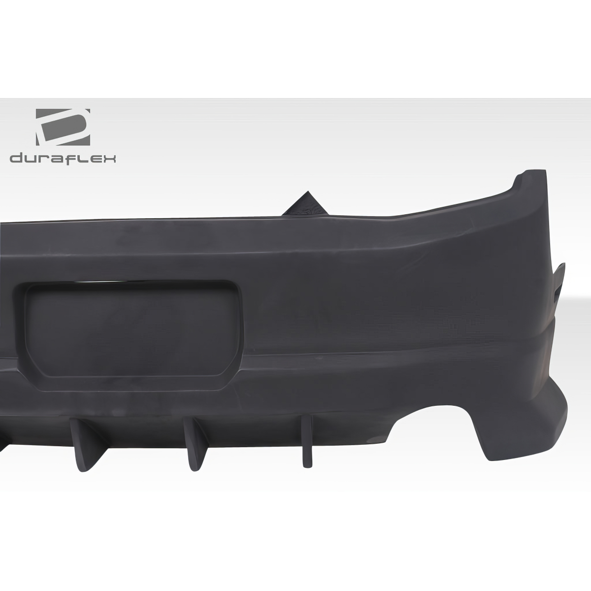 Modify your Ford Mustang 2010 with our Exterior/Rear Bumpers or Lips - Side angle view of rear bumper for Mustang