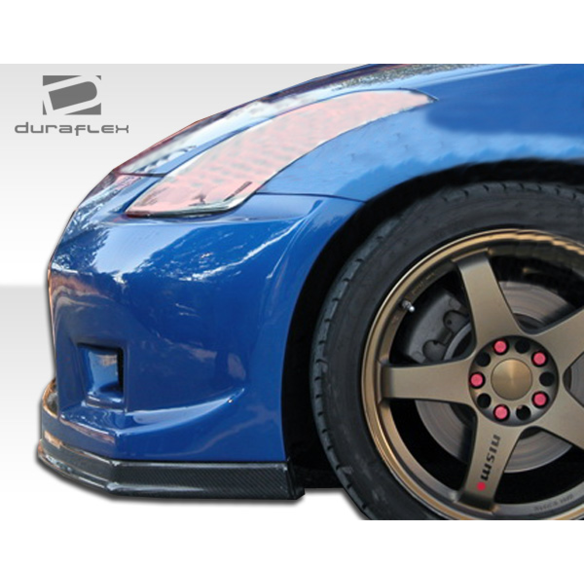 Modify your Nissan 350Z 2003 with our Exterior/Complete Body Kits - Angled view of front bumper and wheel