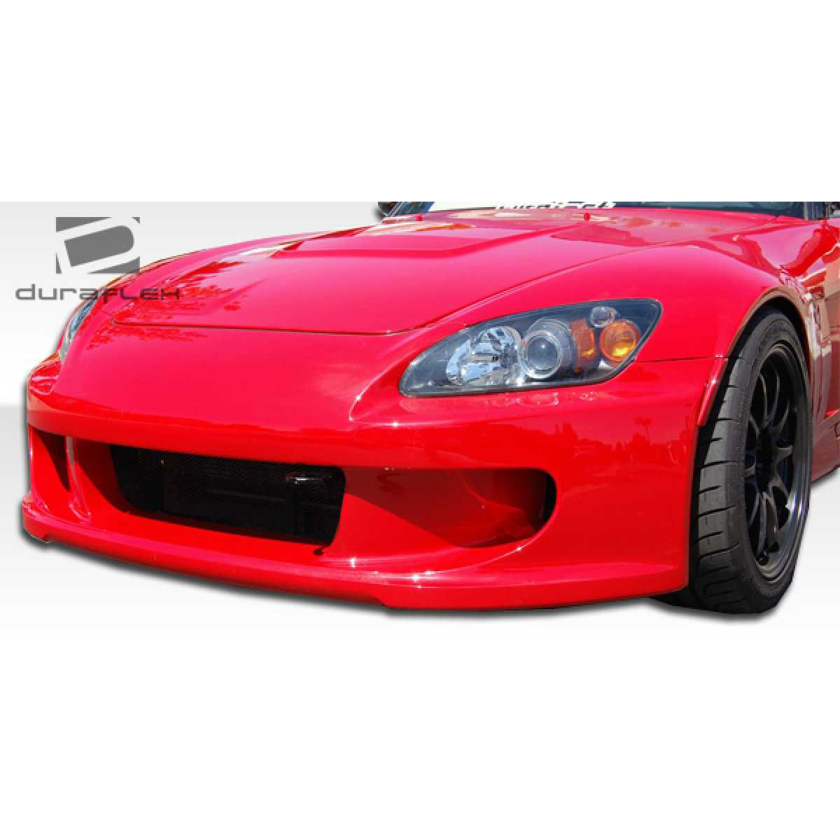 Modify your Honda S2000 2000 with our Exterior/Front Bumpers or Lips - Front view of the vehicle at a slight angle