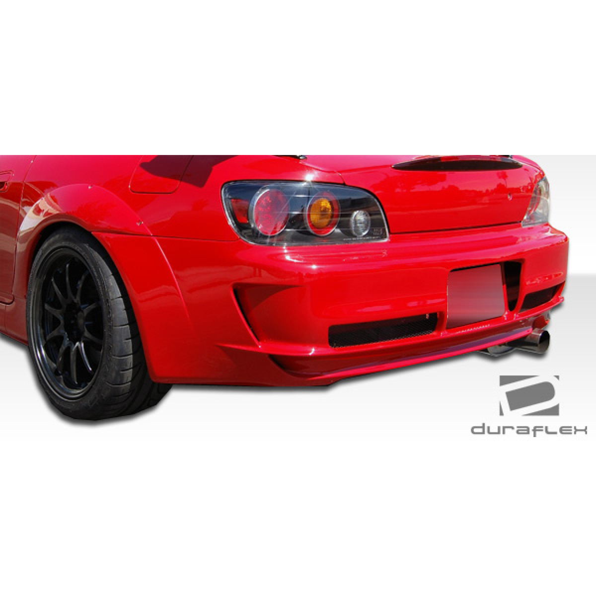 Modify your Honda S2000 2000 with our Exterior/Rear Bumpers or Lips - Rear angle view highlighting bumper design