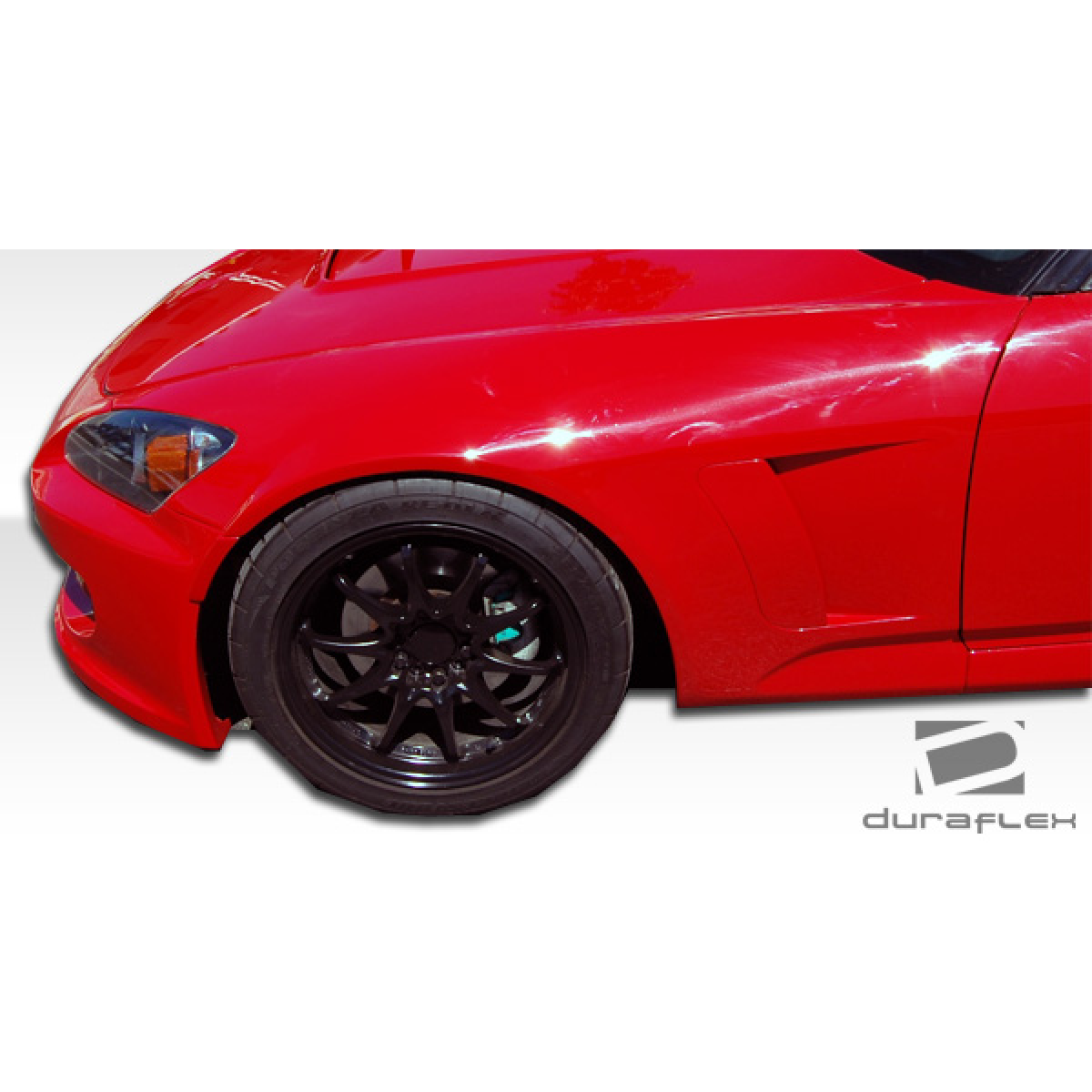 Modify your Honda S2000 2000 with our Exterior/Complete Body Kits - Front angle showing the fender and wheel