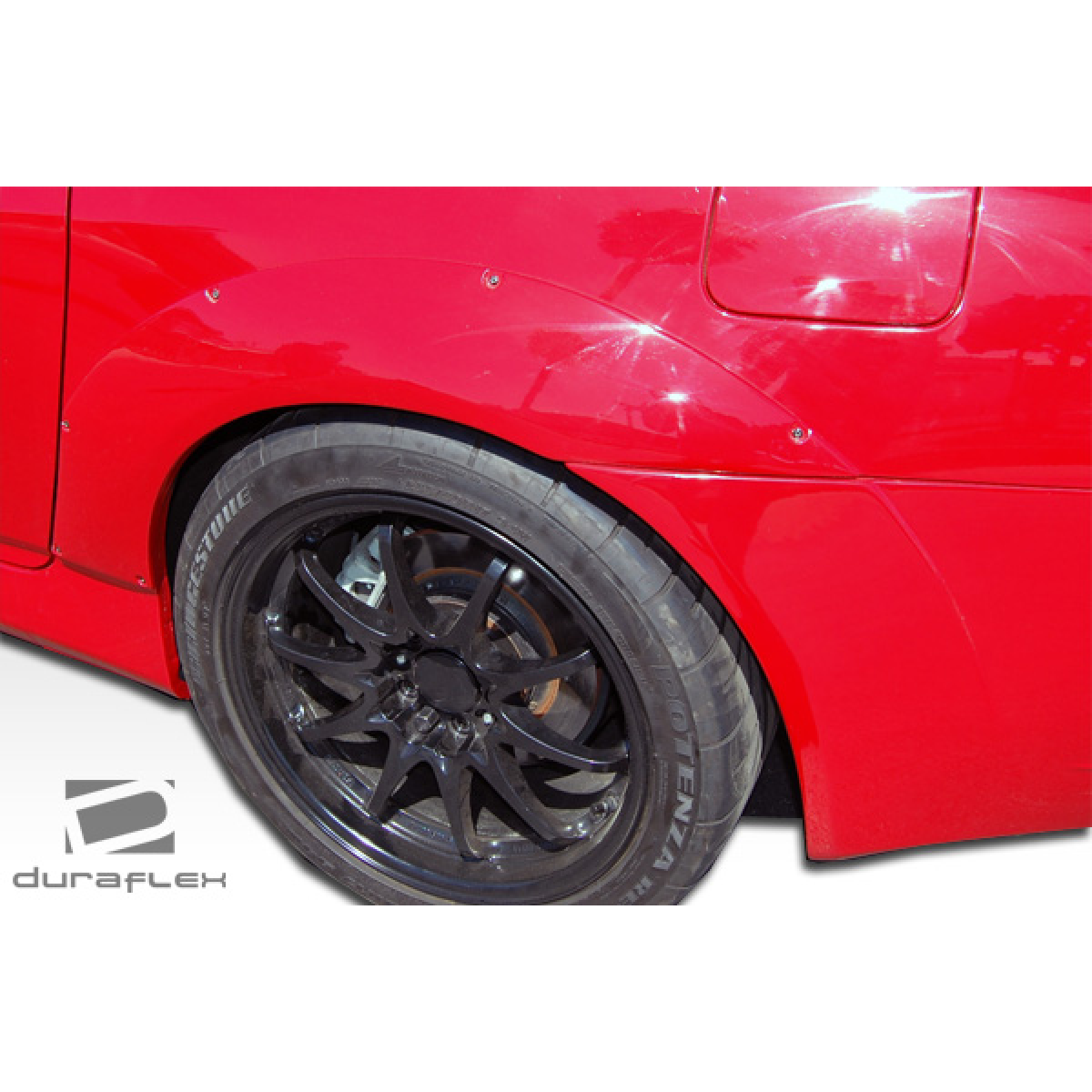 Modify your Honda S2000 2000 with our Exterior/Complete Body Kits - Angle showing rear fender and wheel design