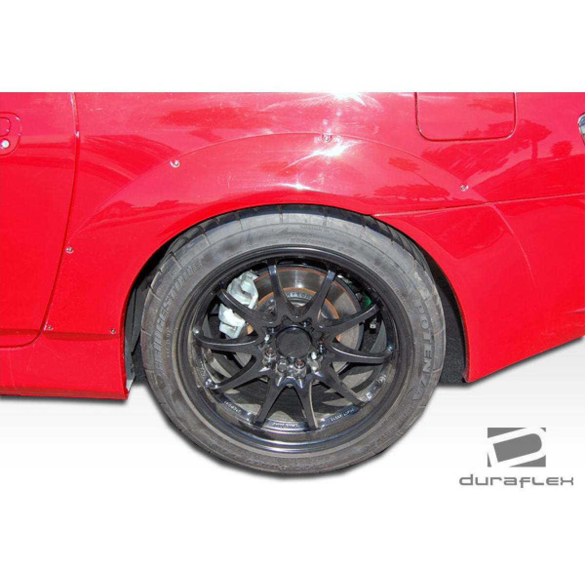 Modify your Honda S2000 2000 with our Exterior/Complete Body Kits - View of rear wheel at a slight angle