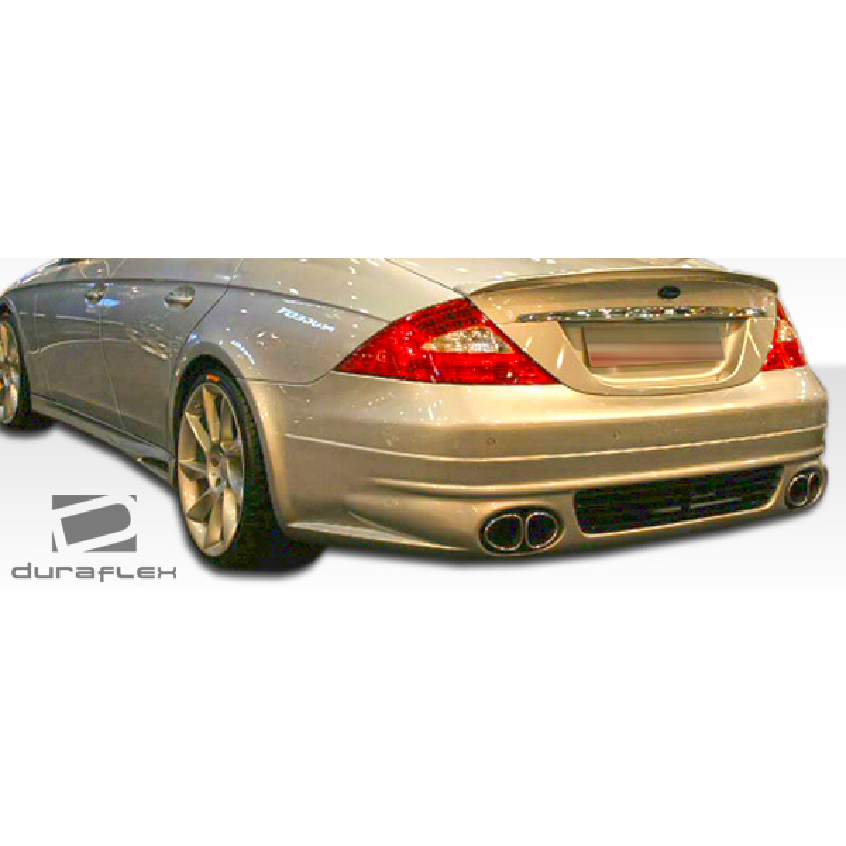 Modify your Mercedes-Benz CLS-Class 2006 with our Exterior/Complete Body Kits - Rear angle of vehicle showing body kit features